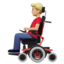 man in motorized wheelchair: medium-light skin tone