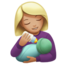 woman feeding baby: medium-light skin tone