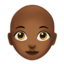 woman: medium-dark skin tone, bald