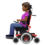 woman in motorized wheelchair: medium-dark skin tone