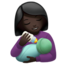 woman feeding baby: dark skin tone