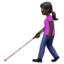 woman with white cane: dark skin tone