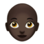 woman: dark skin tone, bald