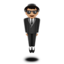 person in suit levitating: medium-light skin tone