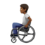 person in manual wheelchair: medium-dark skin tone