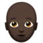 person: dark skin tone, bald