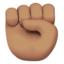 raised fist: medium skin tone