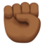 raised fist: medium-dark skin tone