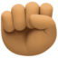 raised fist: medium skin tone