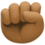 raised fist: medium-dark skin tone