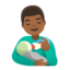 man feeding baby: medium-dark skin tone