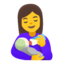 woman feeding baby