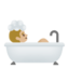 person taking bath: medium-light skin tone