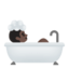 person taking bath: dark skin tone