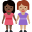 women holding hands: dark skin tone, medium skin tone