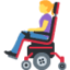 woman in motorized wheelchair