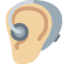 ear with hearing aid: medium-light skin tone