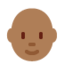 person: medium-dark skin tone, bald